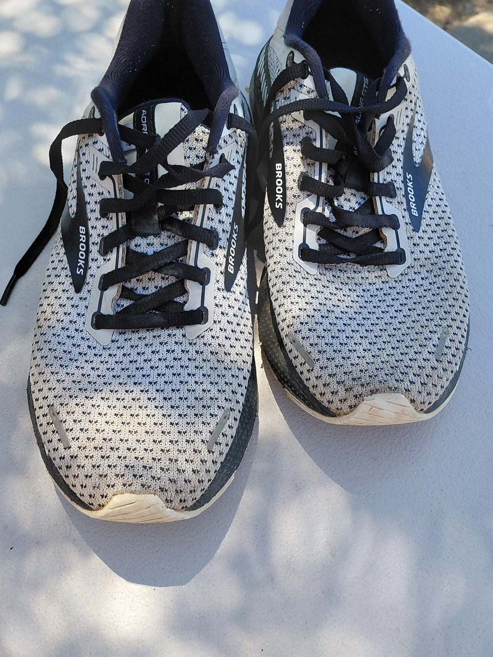 Brooks White and Black Men’s Running Sneakers